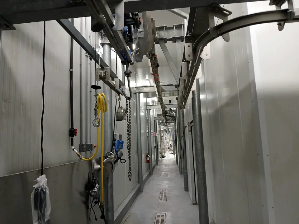 Overhead rail corridor inside the plant